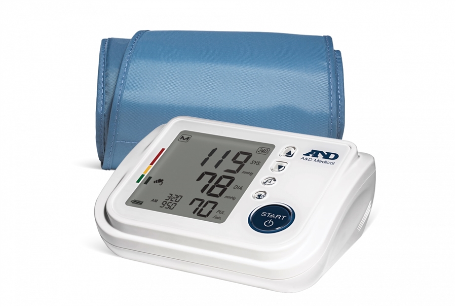 The A&D Medical talking blood pressure monitor: a white tabletop unit with a large tilted display reading 119 over 78 millimeters of mercury with a pulse of 70, a column of small buttons beside the display, one big round blue START button at the front corner, and its rolled blue fabric upper-arm cuff resting behind the unit.